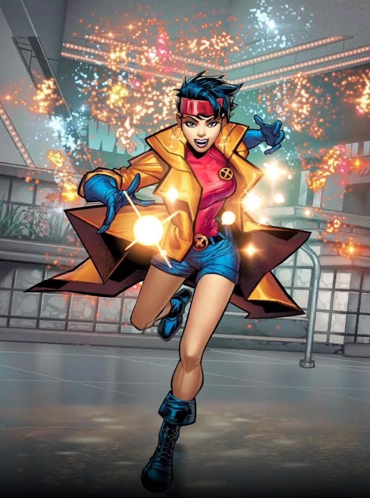 a woman in a yellow jacket and blue shorts is running through the air with fireworks behind her