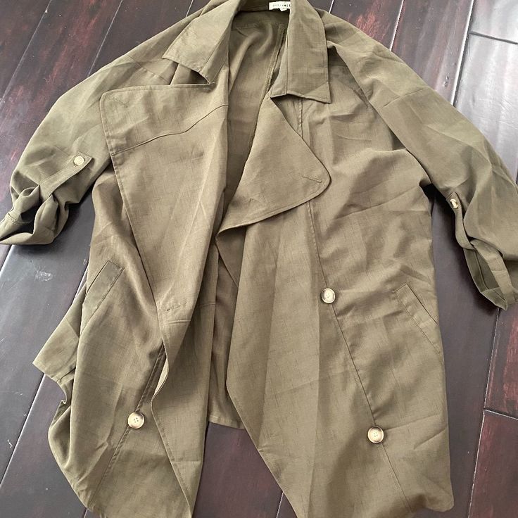 Loose Fitting Army Cardigan/Jacket Never Worn- Excellent Condition Collared Khaki Outerwear For Work, Spring Utility Jacket For Workwear, Fall Utility Style Khaki Blazer, Single-breasted Outerwear With Lapel Collar, Spring Olive Single-breasted Outerwear, Chic Khaki Button-up Outerwear, Khaki Double-breasted Outerwear For Spring, Chic Khaki Outerwear With Buttons, Khaki Long Sleeve Blazer For Spring