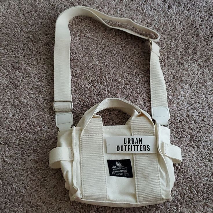 Bdg Serena Mini Tote Bag, Nwt Sold Out On Urban Outfitters Website Has Removable And Adjustable Shoulder Strap, Zipper Closure, Top Handles For Carrying Cute Small Cargo Crossbody Bag In Canvas Material Casual White Canvas Bag For Everyday Use, Urban Rectangular Shoulder Bag For Everyday, White Casual Canvas Bag, White Large Capacity Shoulder Bag For Streetwear, Casual White Canvas Travel Bag, Trendy White Canvas Satchel, Trendy White Everyday Satchel, White Large Capacity Crossbody Canvas Bag, White Canvas Bag With Removable Pouch For Daily Use