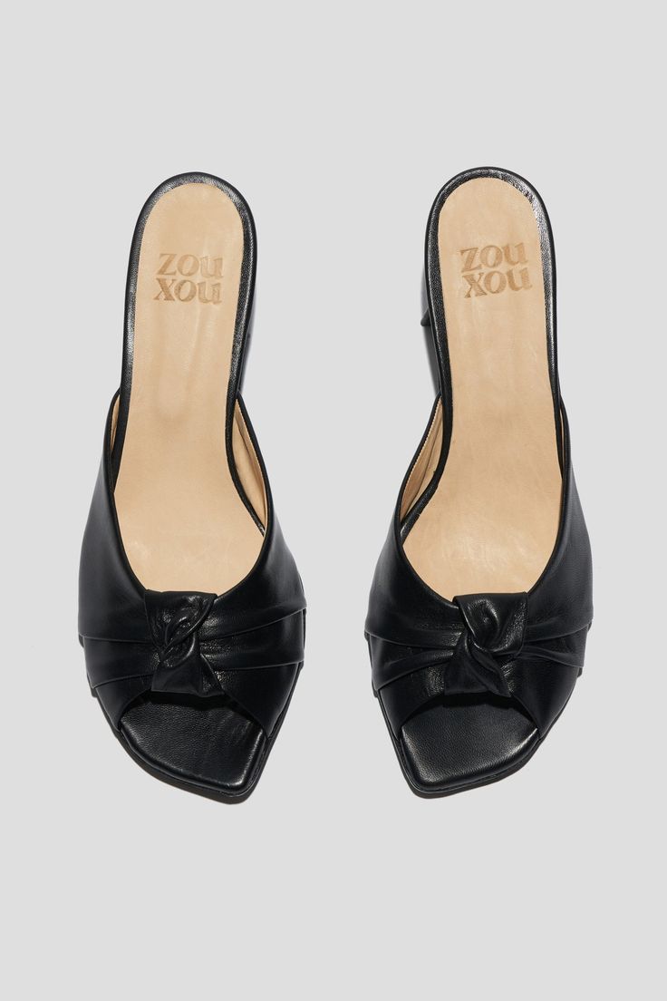 The Greta is a boudoir slipper-inspired mule that captures a playful mix of daytime sensibility & evening refinement. Whether you’re wearing Greta for daytime play or after-dark doings, you will feel both comfortable and well-turned-out, thanks to a low, triangular heel and a pretty pleated-knot detail at the toe. Style Greta back to loose, casual pants for a breezy date look, or wear them with a cocktail dress to the next wedding on your calendar. Kidskin leather upper, vegetable tanned leather lining, leather outsole. Heel height: 1 ¾ inches (45 mm) Handmade in Argentina Heeled Mule, Loafer Mules, Flat Boots, Heeled Loafers, After Dark, Boot Sandals, Vegetable Tanned Leather, Casual Pants, Heel Height