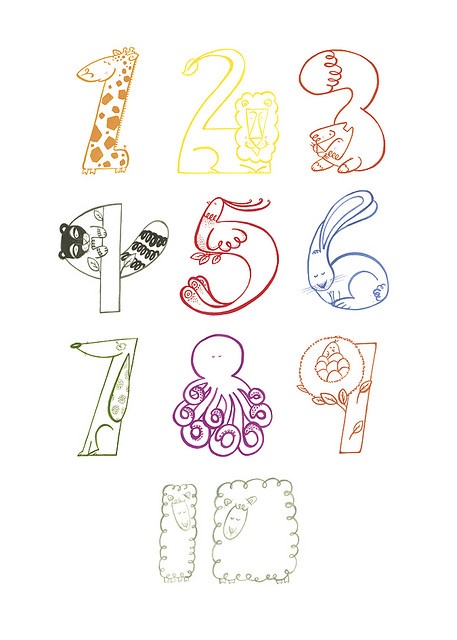 the numbers are drawn with colored pencils on a white paper, and each letter has an animal's face