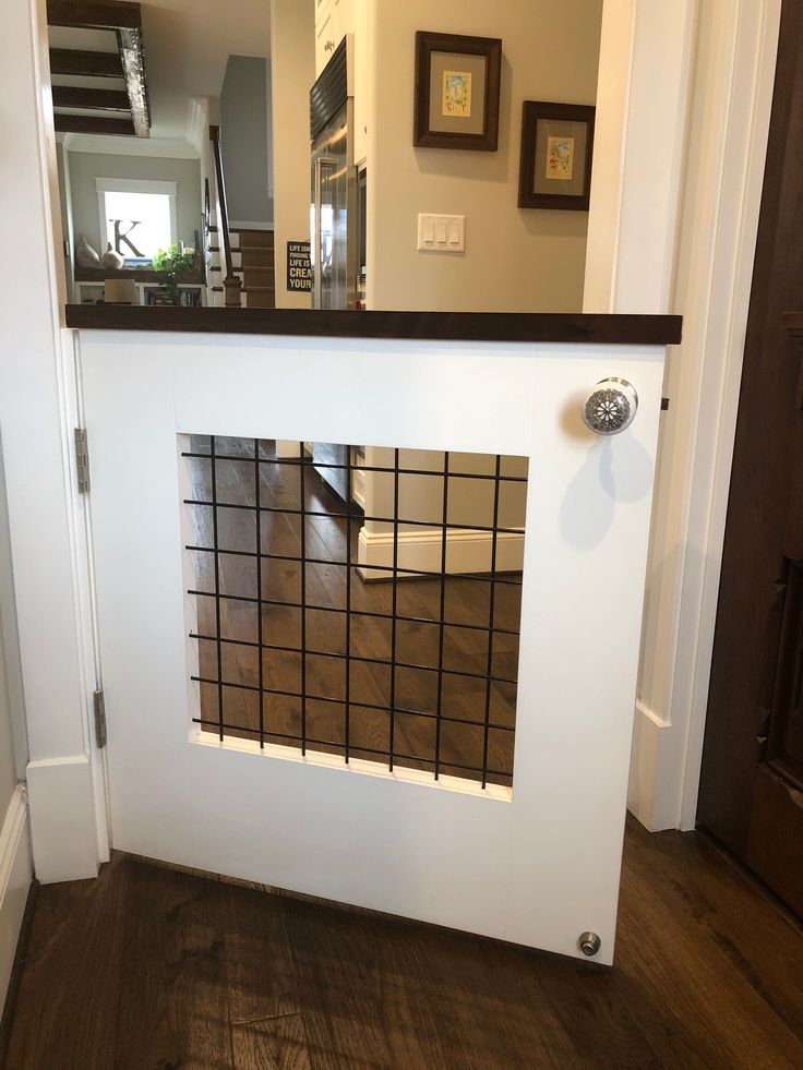 a dog door is open on the inside of a house