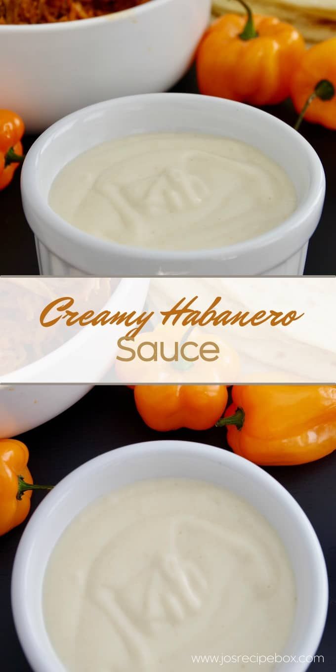 two white bowls filled with soup next to orange peppers