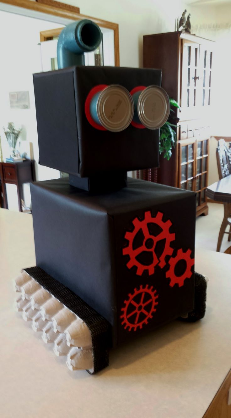 a cake made to look like a robot with gears on it