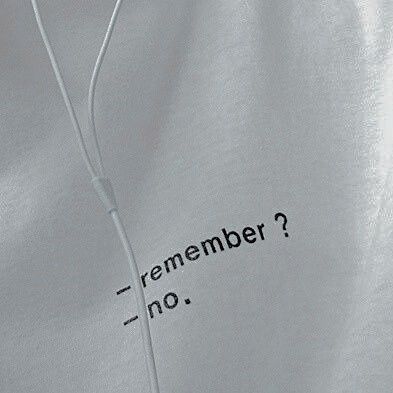 a white shirt with an earbud attached to it that says, remember? no