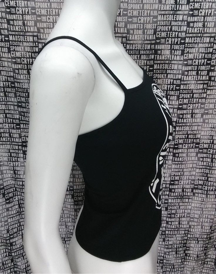 This is a black CRASS crop tank top with spaghetti straps. This has a CRASS image screen printed on the front. 57% cotton/ 38% polyester/ 5% Spandex These are handmade screenprinted and slightly vary from the photo. Please feel free to email me any questions. Thanks for looking. Due to an influx of incorrect addresses if a package is returned, you must pay the shipping cost to resend the item to you. I do not do exchanges and I do not take returns unless the item is damaged. I thoroughly check e Horror Punk, Crust Punk, Black Cropped Tank, Black Crop Top Tank, Crop Tank Top, Made Clothing, Pittsburgh Pa, Black Tank, Black Crop