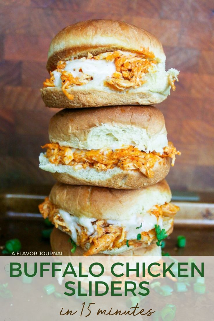 three sandwiches stacked on top of each other with shredded cheese and chicken in the middle