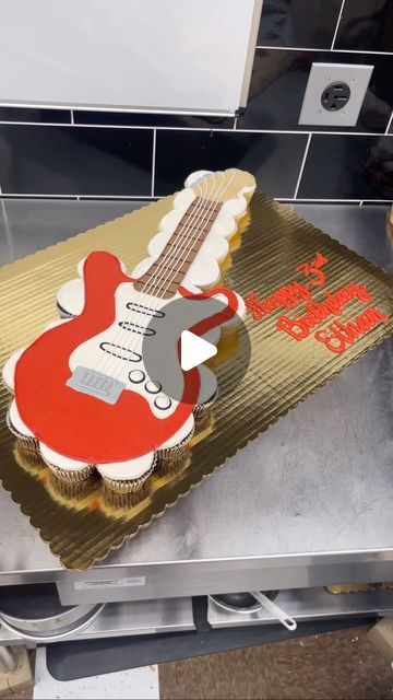 a cake shaped like an electric guitar