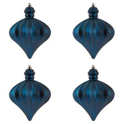 three blue ornaments hanging from the ceiling