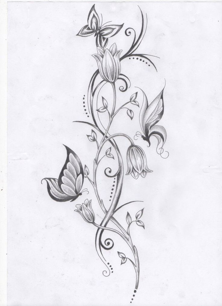 a tattoo design with flowers and butterflies on it