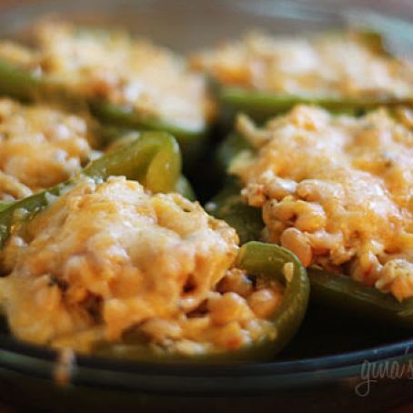 green peppers stuffed with cheese on a plate