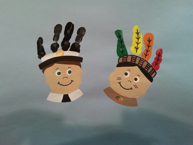 two hand puppets made to look like people