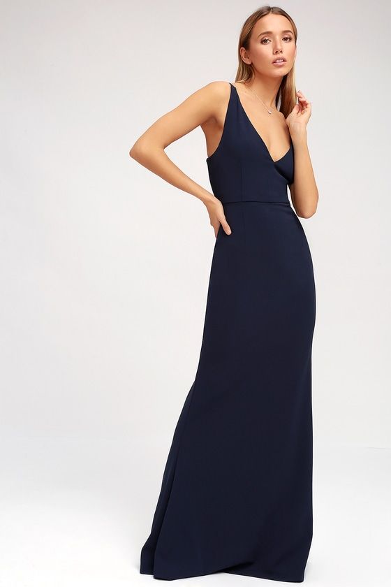 Enchantress will be your middle name when you step out in the Melora Navy Blue Sleeveless Maxi Dress! Medium-weight stretch knit falls effortlessly from tapering straps, to a darted bodice with V-neck and back. Fitted waist meets the full-length maxi skirt with a flaring mermaid hem. Hidden back zipper/clasp. Blue Lace Maxi Dress, Lulus Maxi Dress, Burgundy Maxi Dress, Dress Shops, Navy Blue Maxi Dress, Full Maxi Skirt, Purple Maxi Dress, Dress Blues, Blue Dress Formal