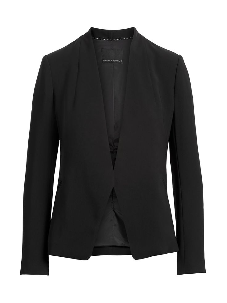 This sleek blazer combines clean lines and a collarless construction with a supremely soft fabric to create the ultimate wardrobe wonder.  Style yours with high-rise jeans and flatforms for day, or dress it up with a pleated midi dress and heels for Modern Notched Blazer For Spring, Sleek Notched Blazer For Spring, Sleek Spring Notched Blazer, Chic Structured Blazer With Hidden Button Closure, Sleek Fitted Blazer For Spring, Sleek Formal Blazer With Concealed Front Fastening, Sleek Spring Blazer For Business Casual, Sleek Structured Spring Blazer, Tailored Spring Blazer With Concealed Front Fastening