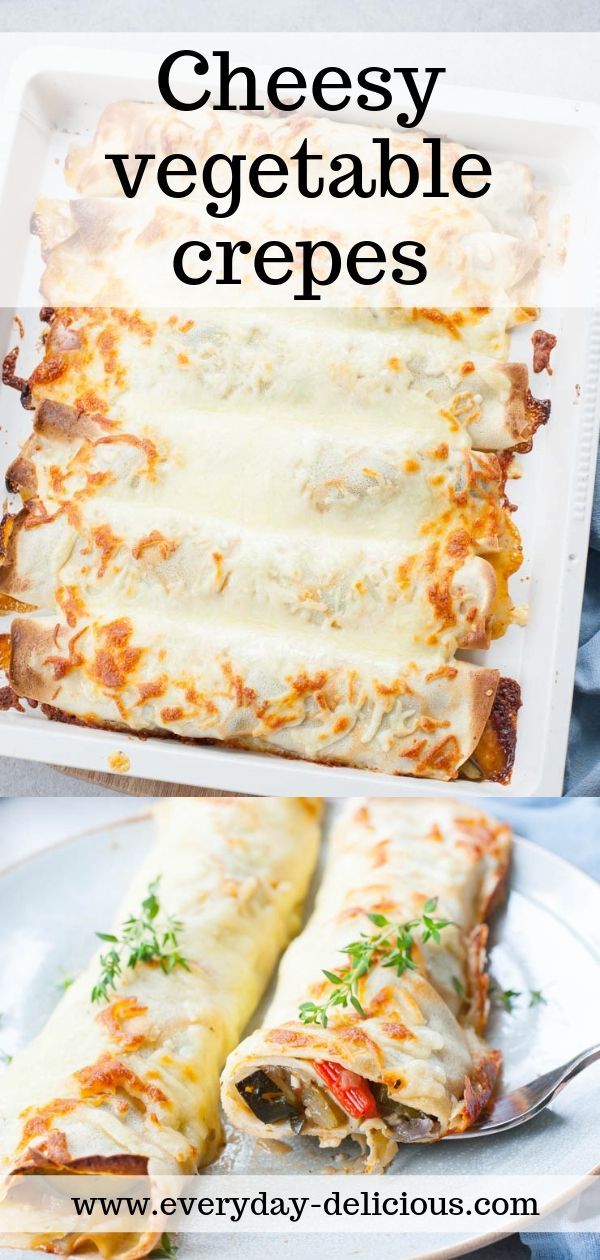 cheesy vegetable crepes on a white plate with a fork in it