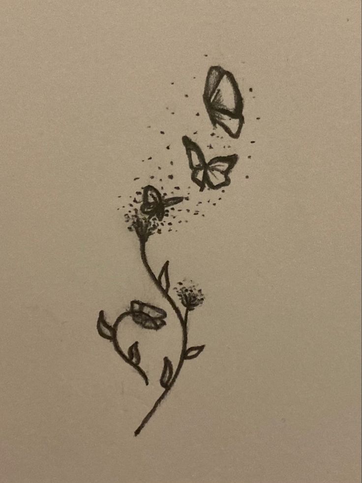 a drawing of two butterflies flying over a flower