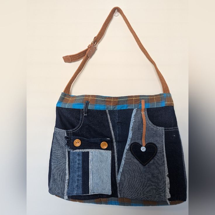 This Bag Is Made Of Blue Denim And Plaid Fabric That Matches The Brown Color Of The Handle. It Is A Casual, Youthful, Timeless Model And Very Appropriate For Daily Use. Never Used. All From My Closet Is Washed, Sanitized And Photograped Before Shipping. Casual Blue Shoulder Bag With Flat Pocket, Denim Hobo Bag With Pockets For Everyday Use, Handmade Denim Blue Shoulder Bag For Everyday, Handmade Denim Shoulder Bag For Everyday Use, Blue Recycled Denim Bags, Brown Denim Bags For Everyday Use, Everyday Denim Hobo Bag With Pockets, Everyday Use Brown Denim Bag, Blue Recycled Denim Shoulder Bag For Everyday