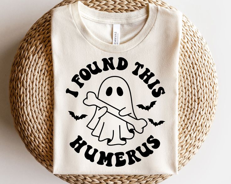 a t - shirt that says i found this flunebus with a ghost on it