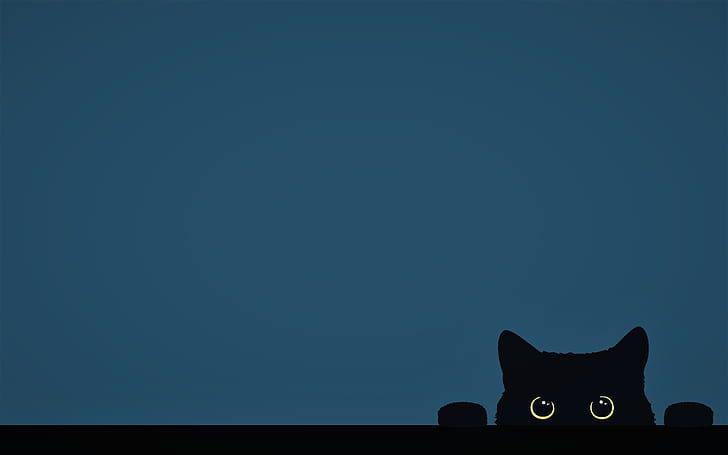 a black cat with glowing eyes sitting in the dark