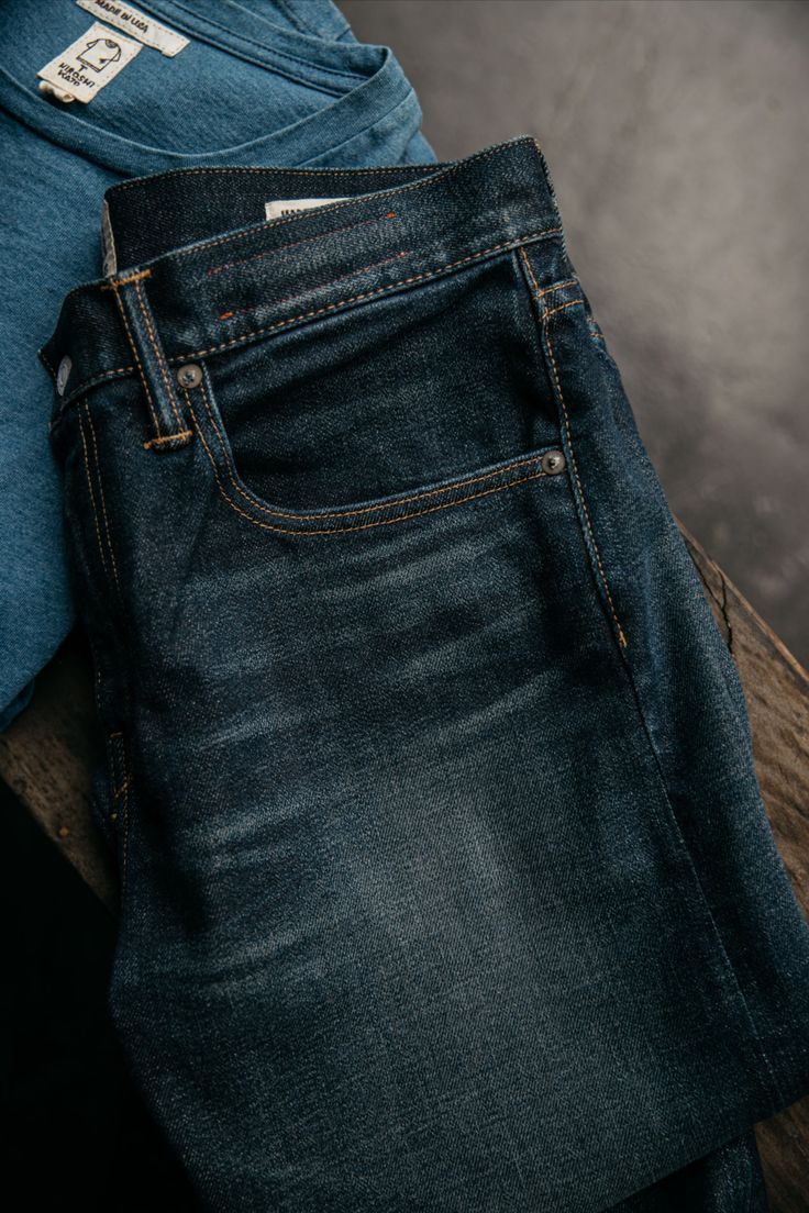 Japanese Denim. American Built. Classic Dark Wash Pre-washed Bottoms, Dark Wash Selvedge Tapered Leg Jeans, Everyday Selvedge Tapered Leg Jeans, Dark Wash Selvedge Jeans With Straight Hem, Medium Wash Selvedge Straight Leg Jeans, Medium Wash Straight Leg Selvedge Jeans, Selvedge Straight Leg Dark Wash Jeans, Dark Wash Mid-rise Selvedge Jeans, Classic Faded Recycled Denim Jeans