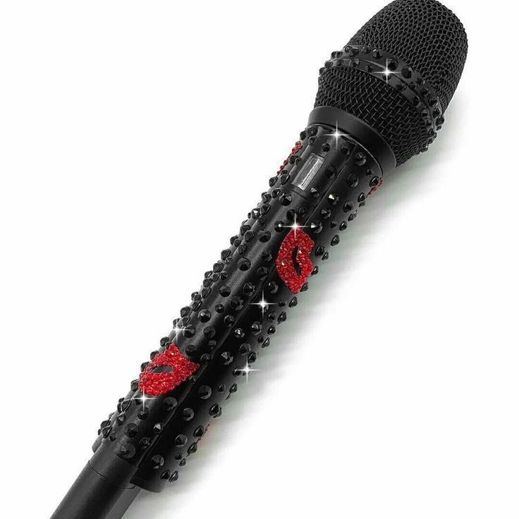 a black microphone with red roses on it