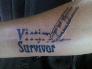 a person with a tattoo on their arm that says, vitamins are the survivor