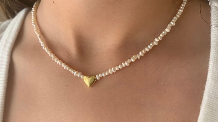 Tiny Pearl Necklace, Heart Necklace, Jewelry gift, Pearl Necklace, Pearl Choker,  Pearl Jewelry, Freshwater pearls, seed pearl necklace, tiny pearl choker, Birthday Gift for her Necklace Description: 925 Sterling Silver Natural Tiny Freshwater Pearl  14K Gold /  Rose Gold /  Rhodium Plated Heart Pendant Necklace Length 12'' - 18'' inches Hypogenetic, Nickel-free PACKAGING & SHIPPING All jewels are nicely packaged ready to gift in elegant jewelry box. Perfect gift for you and your loved one  as a Gold Heart-shaped Pearl Beaded Necklaces, Gold Heart-shaped Pearl Beaded Necklace, Elegant Gold Beaded Necklace With Heart Beads, Elegant Gold Beaded Necklaces For Valentine's Day, Dainty Heart-shaped Beaded Necklace Gift, Dainty Beaded Necklaces With Round Beads For Wedding, Dainty Single Strand Beaded Necklaces For Wedding, Elegant Beaded Necklaces With Heart Charm As Gift, Dainty Single Strand Beaded Necklace For Wedding