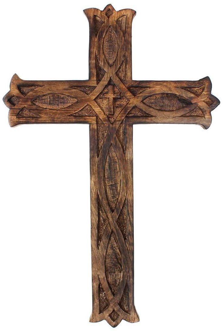 a wooden cross with intricate designs on it