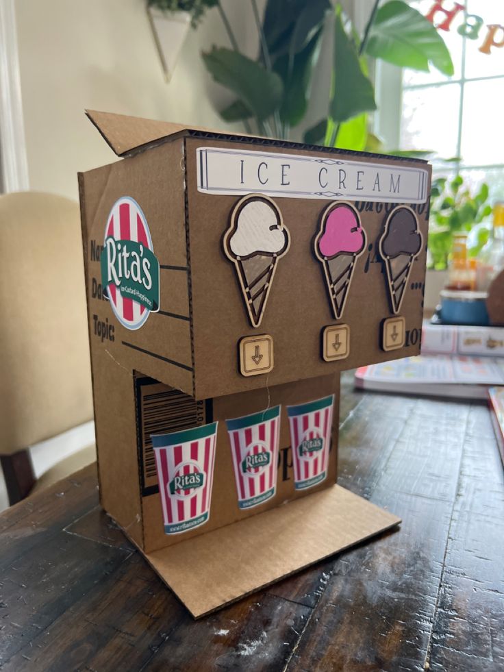 an ice cream stand made out of cardboard