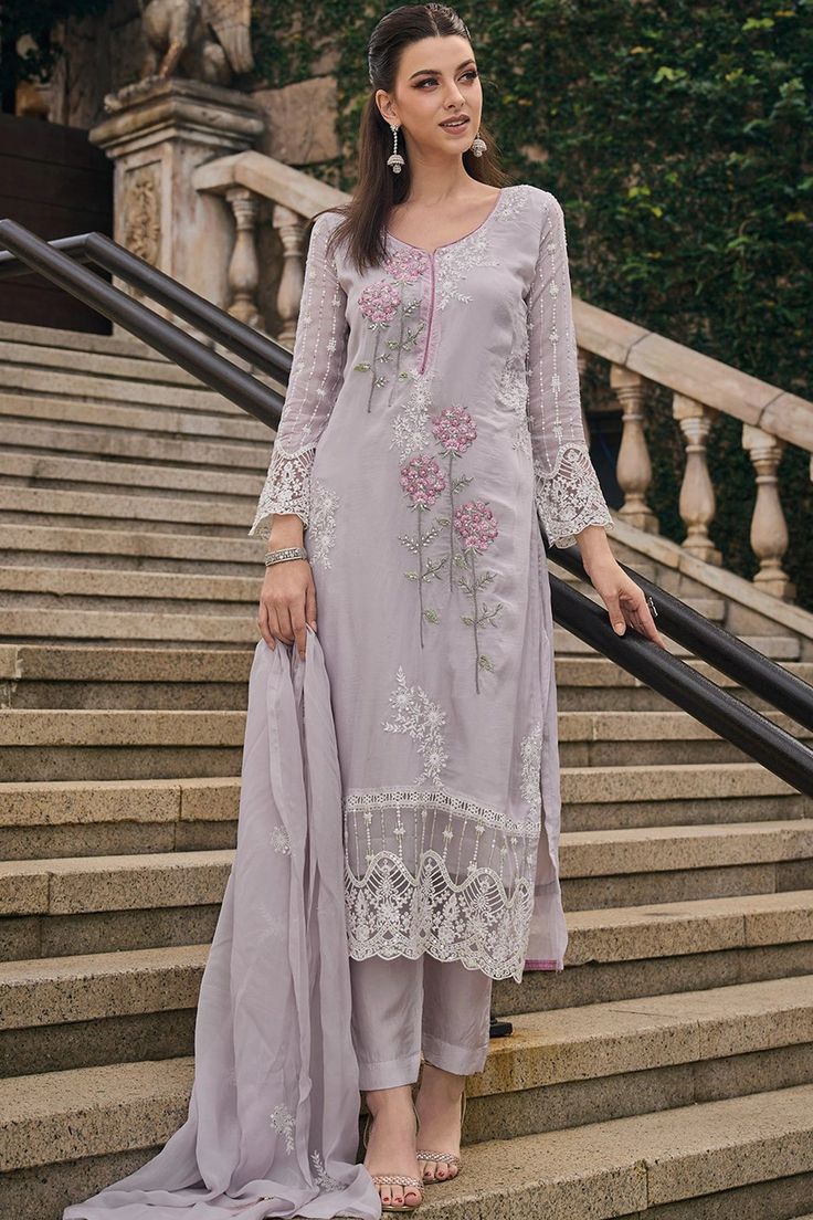 This exquisitely designed soft organza pant style suit Pakistani Suit is embellished with delicate resham, beads, sequins, and lace work, making it a standout piece for any occasion. From festive celebrations to social gatherings and cultural events, this pant suit showcases the ultimate combination of style and grace.      Fit:   Slim Fit (more fitted and snug at bust area)      Top: Soft Organza Silk    Bottom: Blended Silk    Dupatta: Embroidered Organza Silk    Embroidery resham thread, bead Pakistani Organza Suits, Suits Design Latest, Phulkari Pants, Area Top, Lucknowi Kurta, Thread Beads, Suit Pakistani, Salwar Suit Designs, Organza Suits