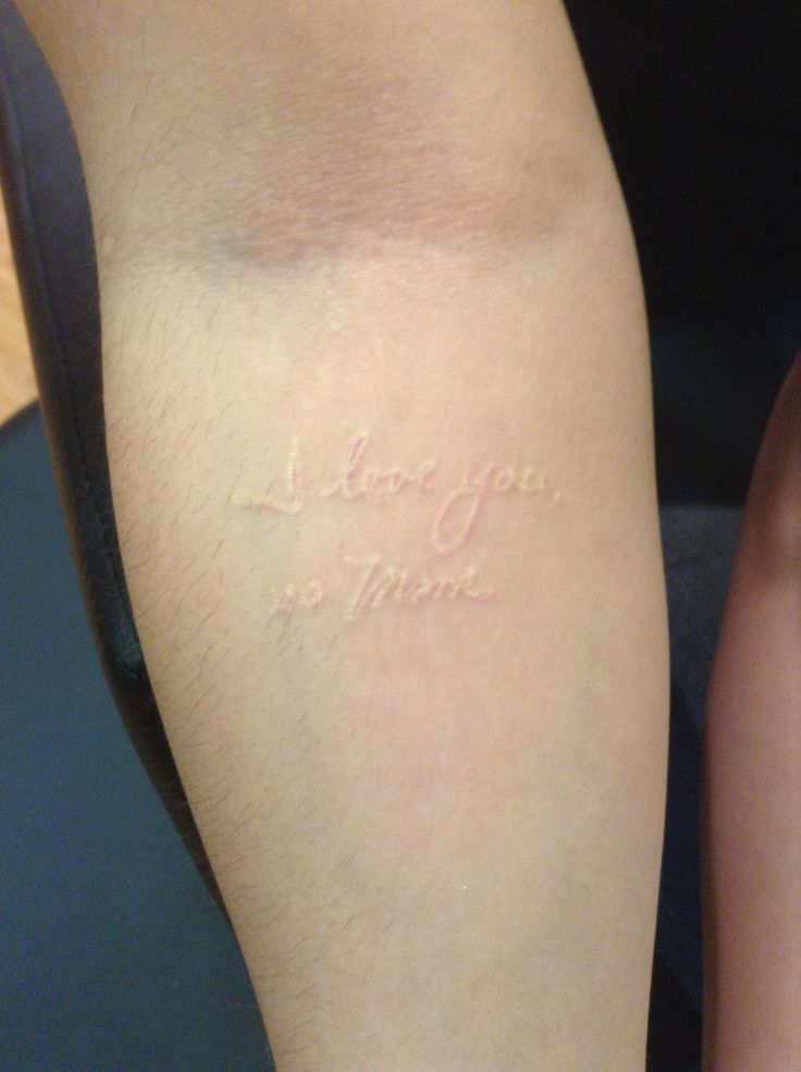 someone with a tattoo on their arm that says i love you so much