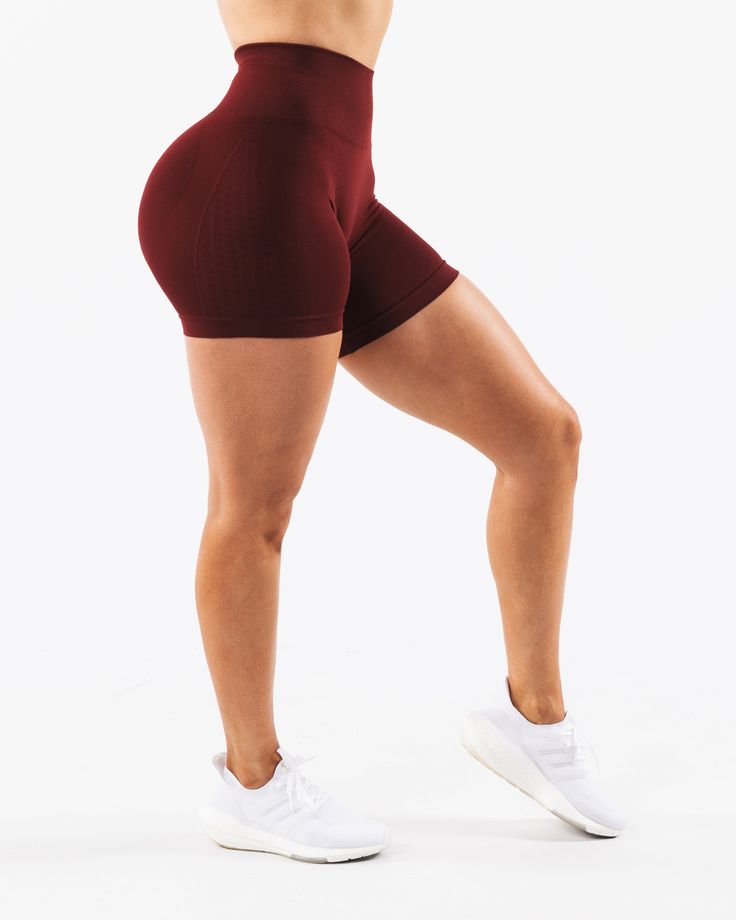 HIGHLIGHTS. High-waisted short 3-tiered tapered waistband Seamless knit fabric No front seam Back scrunch seam detail to enhance curves New leg and glute contouring panels FIT SUGGESTION. This item runs true to Alphalete's standard seamless fit. If you are between sizes, we recommend sizing up.. Model. . is 5’4”/162.5cm, wearing a size XS with 39.5"/100cm hips and 26”/66cm waist.. MATERIALS AND WASHING DIRECTIONS. 51% Polyamide, 38% Polyester, 11% Elastane. We recommend washing inside-out on a c Seamless Fitted Athletic Shorts, Fitted Seamless Athleisure Biker Shorts, Fitted Seamless Activewear With Short Legs, Fitted Seamless Gym Shorts, Fitted Athleisure Biker Shorts In Seamless Fabric, Seamless Fitted Activewear Shorts, Athleisure Seamless Fabric Biker Shorts, Athleisure Seamless Biker Shorts, Athleisure Fitted Biker Shorts In Seamless Fabric