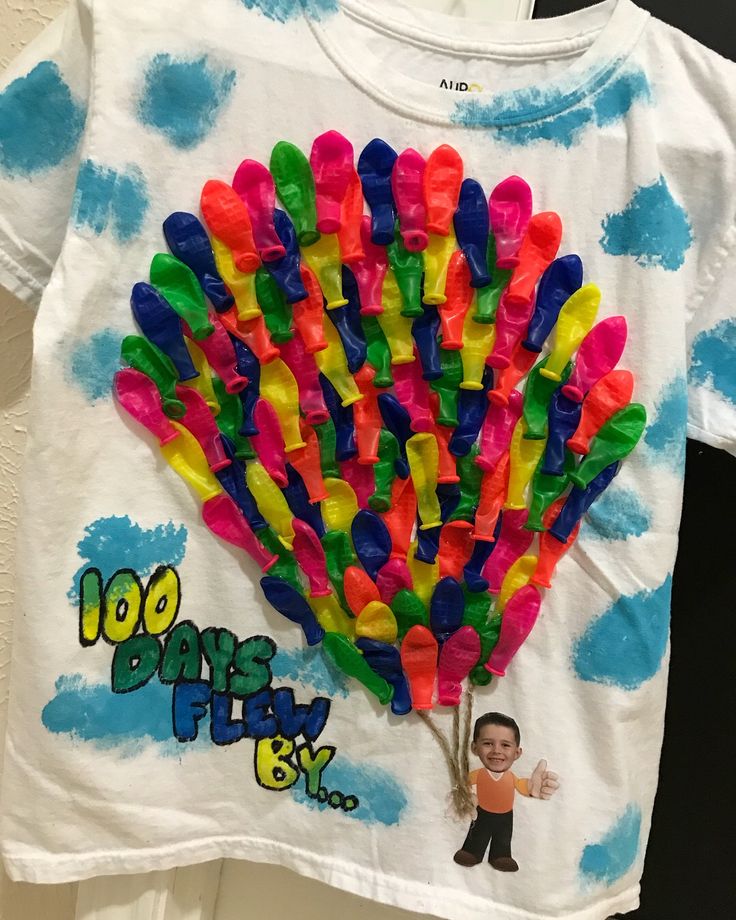 a t - shirt that has been made to look like a tree with colorful sticks sticking out of it