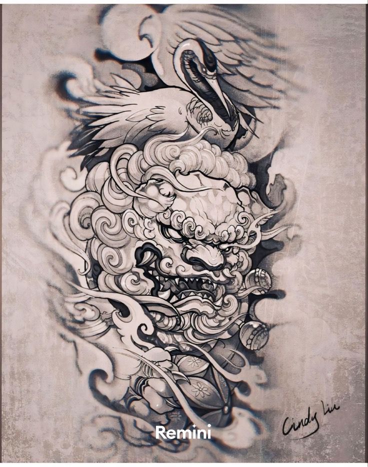 an artistic tattoo design on the back of a man's arm, with clouds and birds