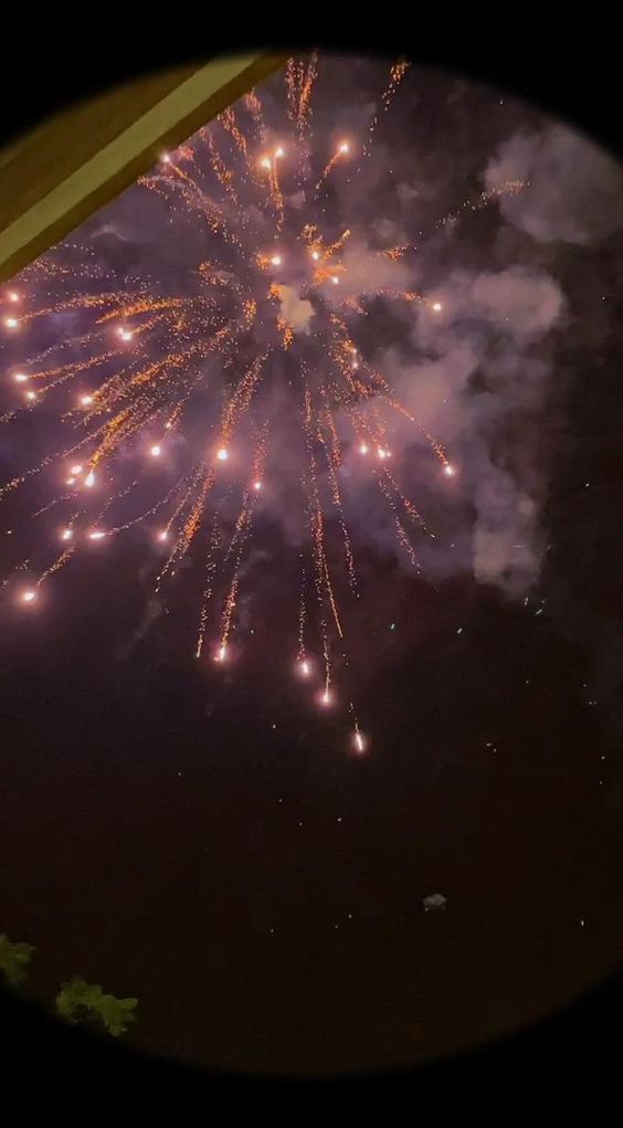 fireworks are lit up in the night sky