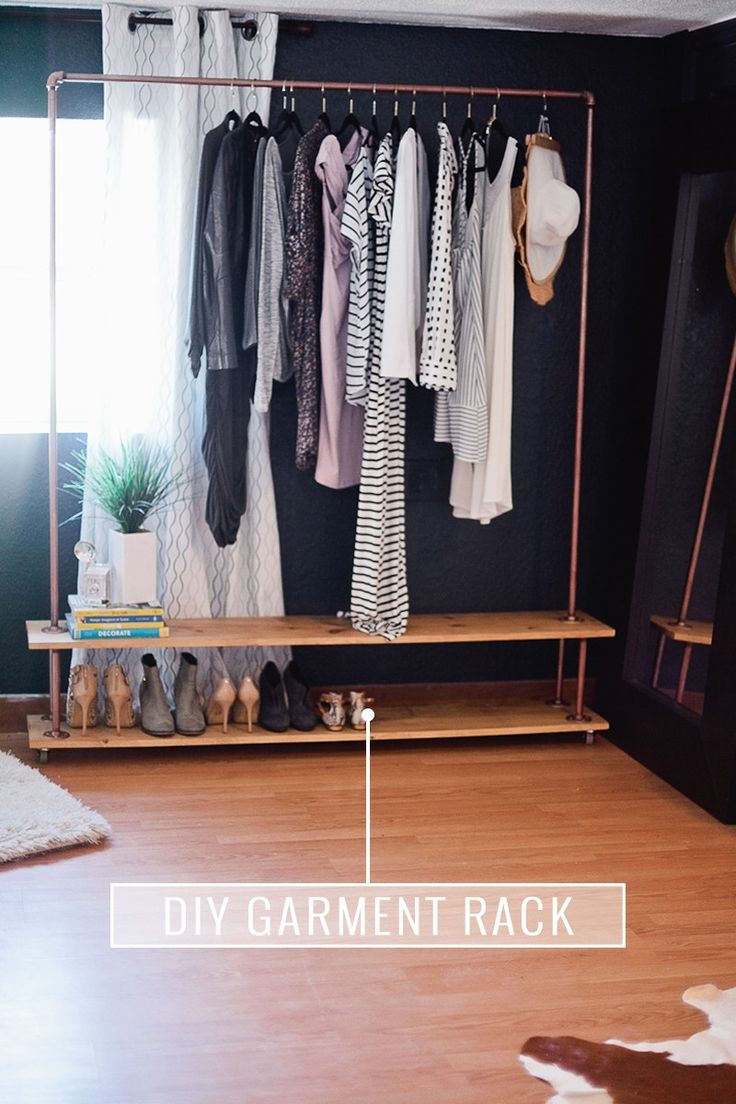 an organized closet with clothes and shoes hanging on the rack, labeled diy garment rack