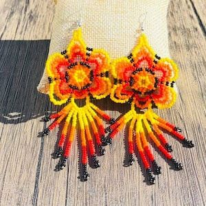 Mexican Huichol Earrings | Etsy Artisan Beaded Flower Drop Earrings, Artisan Beaded Drop Flower Earrings, Artisan Handmade Adjustable Beaded Earrings, Handwoven Beaded Earrings For Beach, Festival Yellow Handwoven Beaded Earrings, Traditional Yellow Beaded Earrings, Yellow Handwoven Beaded Earrings For Festivals, Unique Handwoven Beaded Earrings For Beach, Handmade Yellow Beaded Earrings For Beach