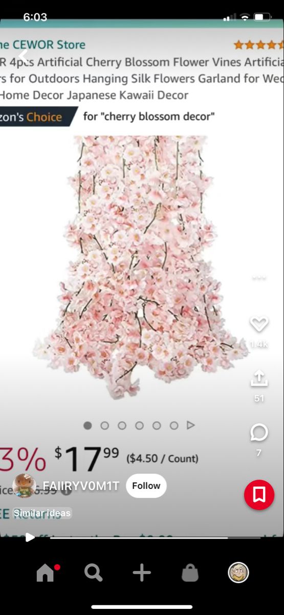 a cell phone with an ad for cherry blossom flowers on the front and back side