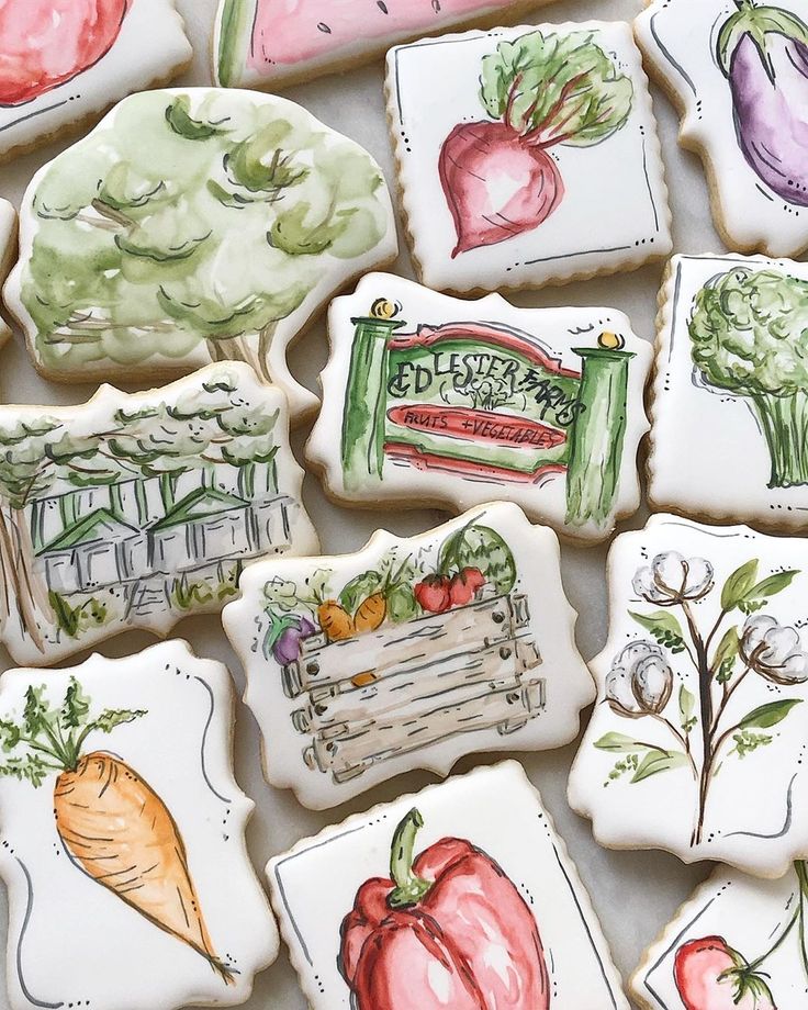 many decorated cookies with different designs on them