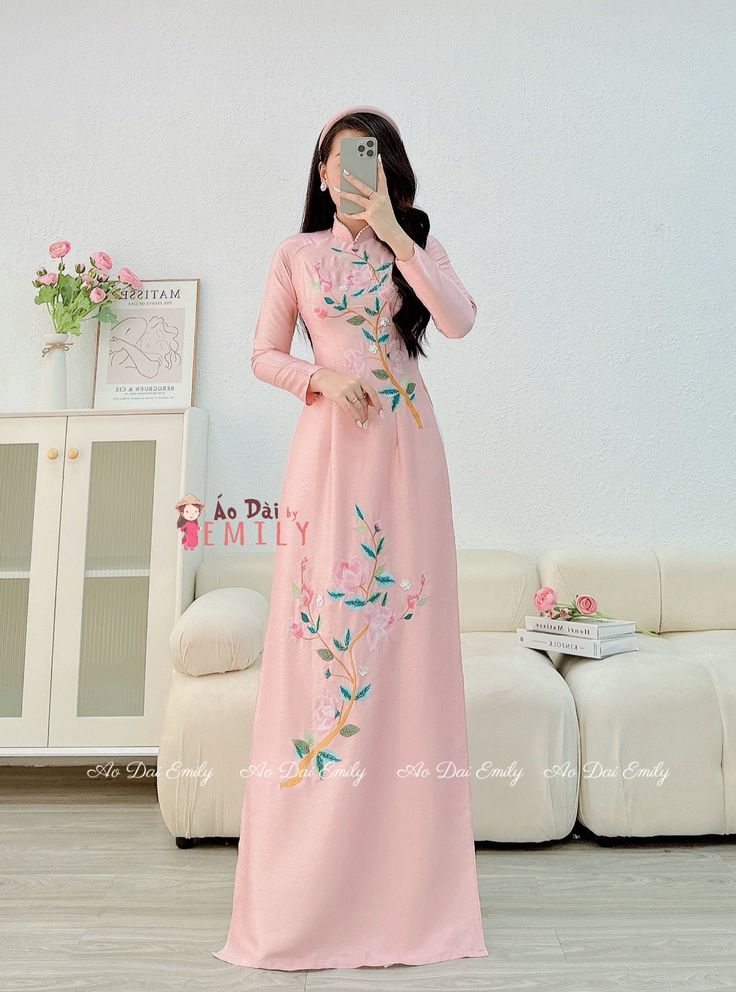 🌻 Stretchy level: 2/10 🌻Material: Lụa vân gỗ 🌻 The measurement of this ao dai (long dress) is in Vietnamese size (American size tends to be bigger for the same size). Please LOOK AT THE SIZE CHART CAREFULLY BEFORE ORDERING. There might have some chalk writings on the fabric due to making process. These marks can be washed away easily. 🌻No returns or exchanges Buyer can contact seller about any issues with an order. 🌸 Follow us Facebook/aodaiemily www.aodaiemily.com 💜 Thank you very much!💜 Wedding Maxi Dress With Floral Applique, Fitted Floral Embroidered Ao Dai For Wedding, Fitted Ao Dai With Floral Embroidery For Wedding, Fitted Floral Applique Maxi Dress For Wedding, Elegant Pink Ao Dai With Floral Embroidery, Long Sleeve Floral Print Maxi Dress For Wedding, Spring Ceremony Dress With Floral Embroidery, Elegant Pink Floral Embroidered Maxi Dress, Floor-length Dress For Spring Ceremonies