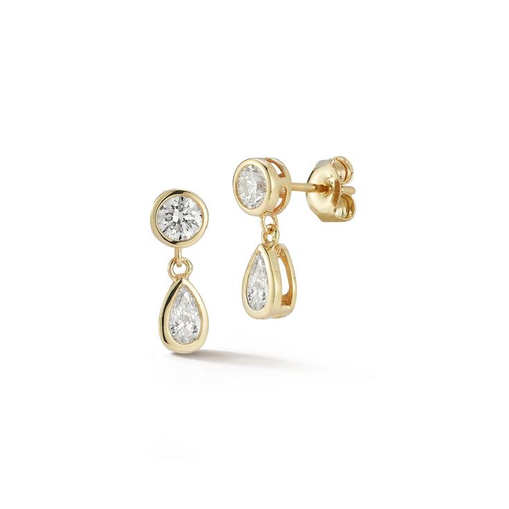 14kt Round and Pear Diamond Drop Earrings The Diamanté Collection takes its inspiration from Mateo's recent visit to the De Beers Orapa Diamond Mine in Botswana. Mother Nature has done a fantastic job creating these magnificent diamonds. Our only duty was to simply highlight each stone for daily wear. Round and Pear shape diamonds are beautifully bezel set in solid gold. 14kt Yellow Gold 1.47gm Gold 0.94ct Diamonds Post Back Made in New York City Timeless Gold Pear-shaped Diamond Earrings, Timeless Pear-shaped Gold Diamond Earrings, Yellow Gold Diamond Pear-shaped Earrings, Timeless Pear-shaped Brilliant Cut Earrings, Timeless Yellow Gold Teardrop Diamond Earrings, Timeless Teardrop Yellow Gold Diamond Earrings, Yellow Gold Pear-shaped Brilliant Cut Earrings, Pear-shaped Yellow Gold Diamond Earrings, 14k Gold Brilliant Cut Pear-shaped Earrings