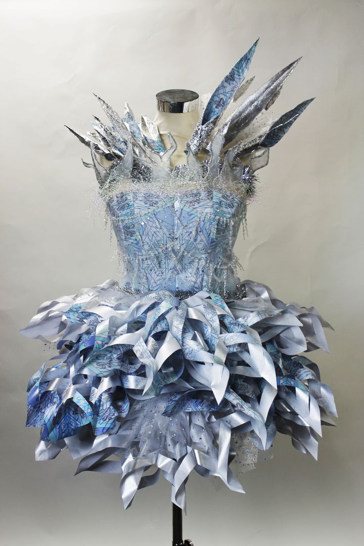 a dress made out of blue and silver paper