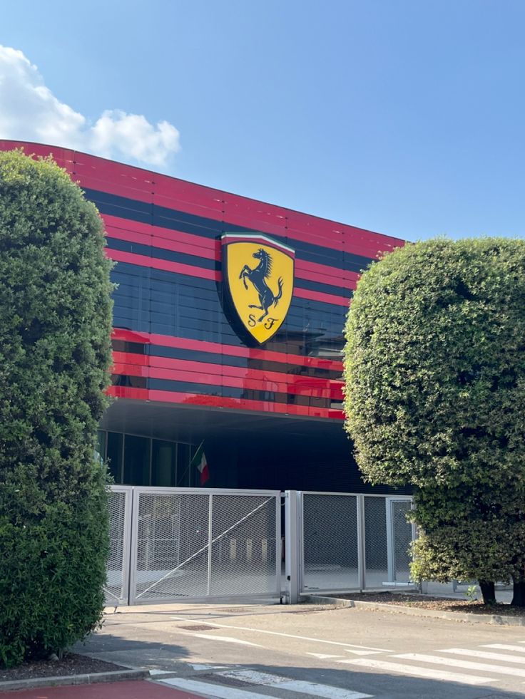 a large building with a ferrari logo on it