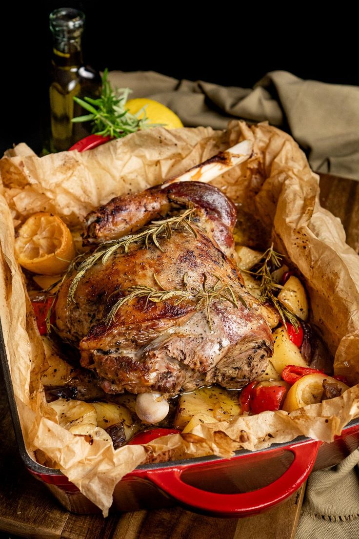 a roasting pan filled with meat and vegetables