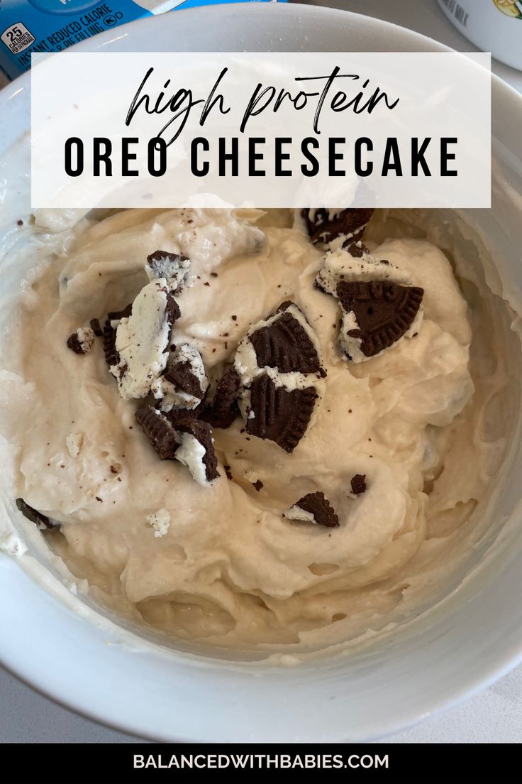 a bowl filled with cream cheesecake and oreo cookies