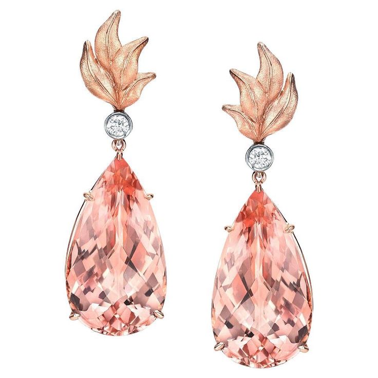 Morganite earrings, featuring a pair of enticing 31.63 carat total Morganite pear shapes, suspended from a pair of 0.19 carat total round brilliant diamonds. Crafted in 18K rose gold and 18K white gold. Total length: 1.75" inches. Returns are accepted and paid by us within 7 days of delivery. Colorful alternatives for Morganite diamond earrings are Pink Sapphire earrings, Pink Diamond earrings, Pink Tourmaline earrings, Pink Spinel earrings. Pink Diamond Earrings, Rose Gold Drop Earrings, Morganite Earrings, Yellow Gold Drop Earrings, Pink Sapphire Earrings, Vintage Drop Earrings, Morganite Diamond, Tourmaline Earrings, Earrings Diamond