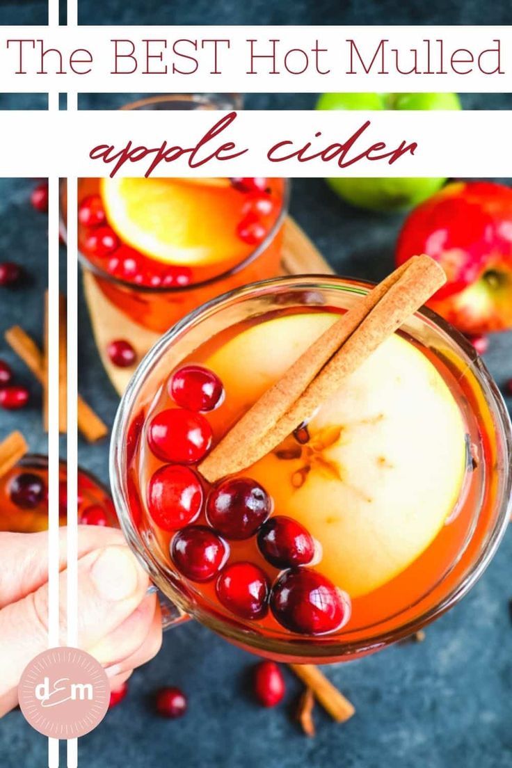 the best hot mulled apple cider recipe with cinnamon stick and cranberries