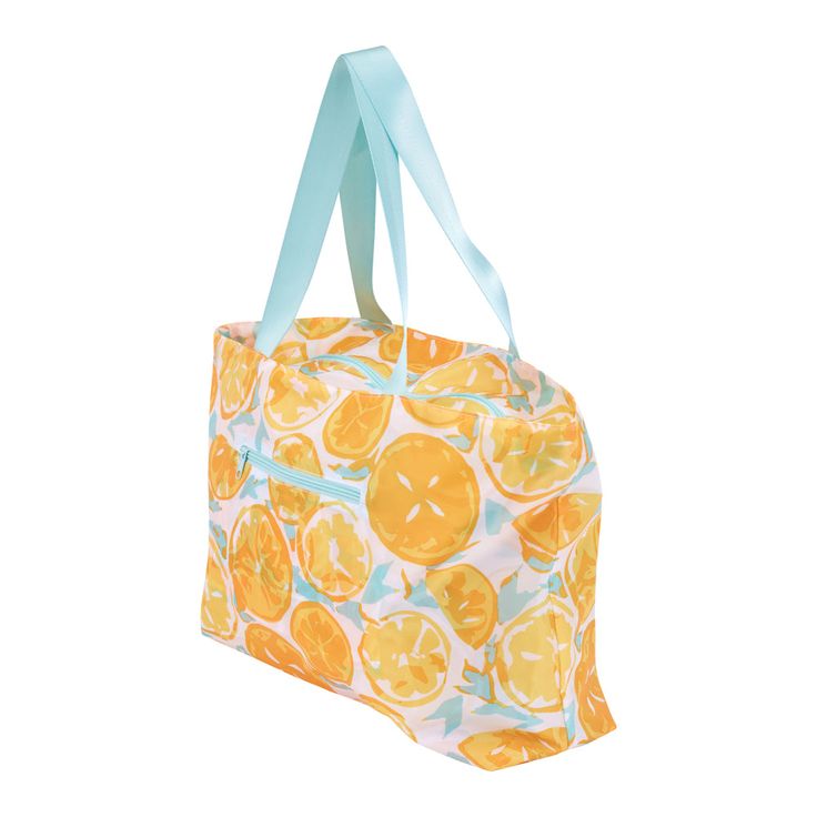 an orange print lunch bag with blue handles and two straps on the handle, sitting in front of a white background