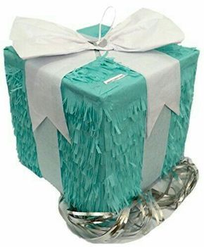 a gift wrapped in blue and white paper with a bow on it's top