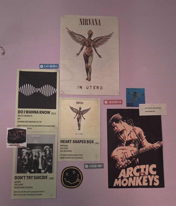 various posters and stickers on the wall